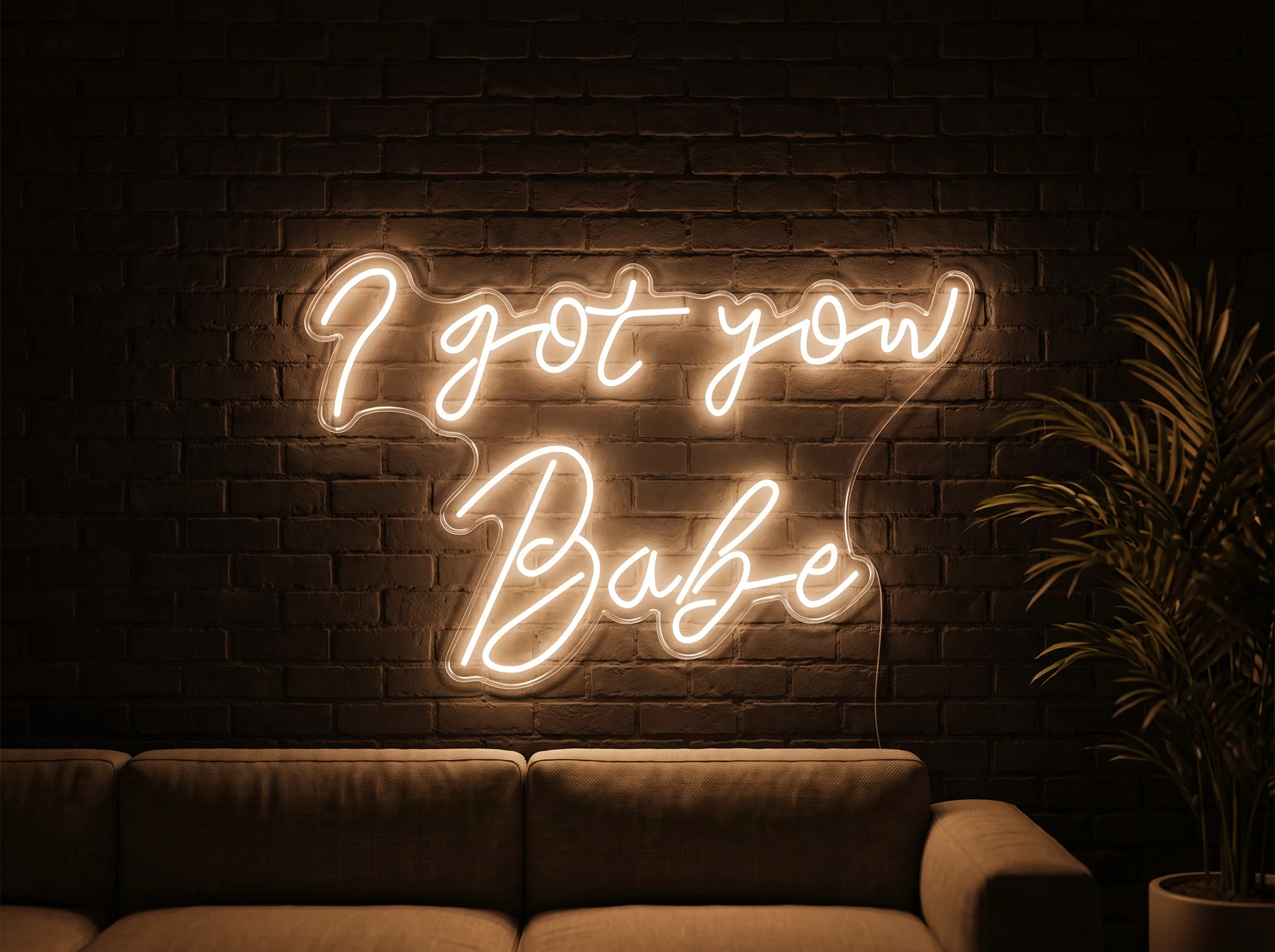 Neonskylt «I Got You Babe» i orange LED-neon, monterad på vägg