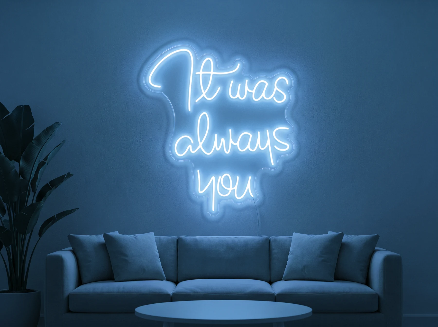 Neonskylt «It Was Always You» i isblå LED-neon, monterad på vägg