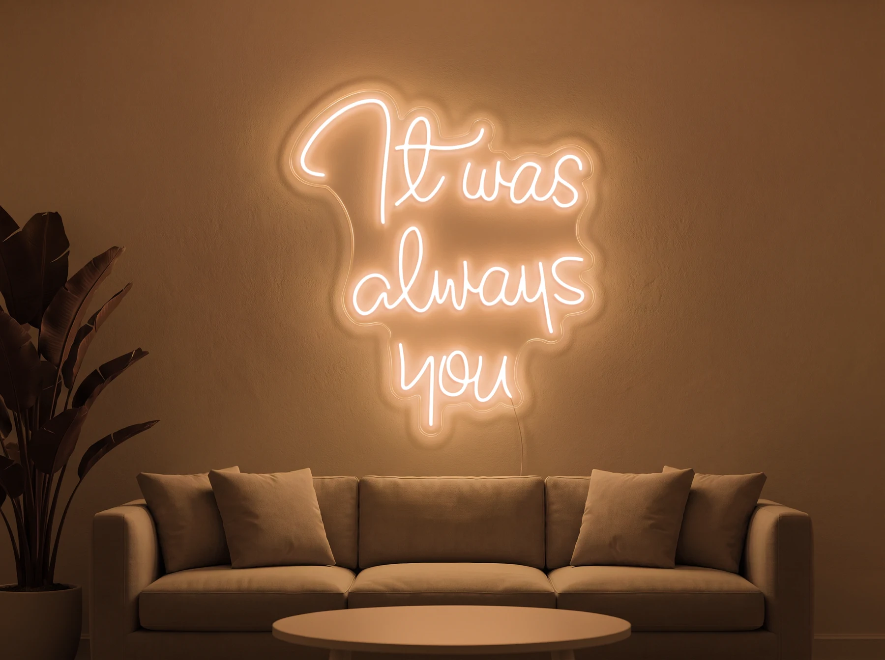 Neonskylt «It Was Always You» i orange LED-neon, monterad på vägg