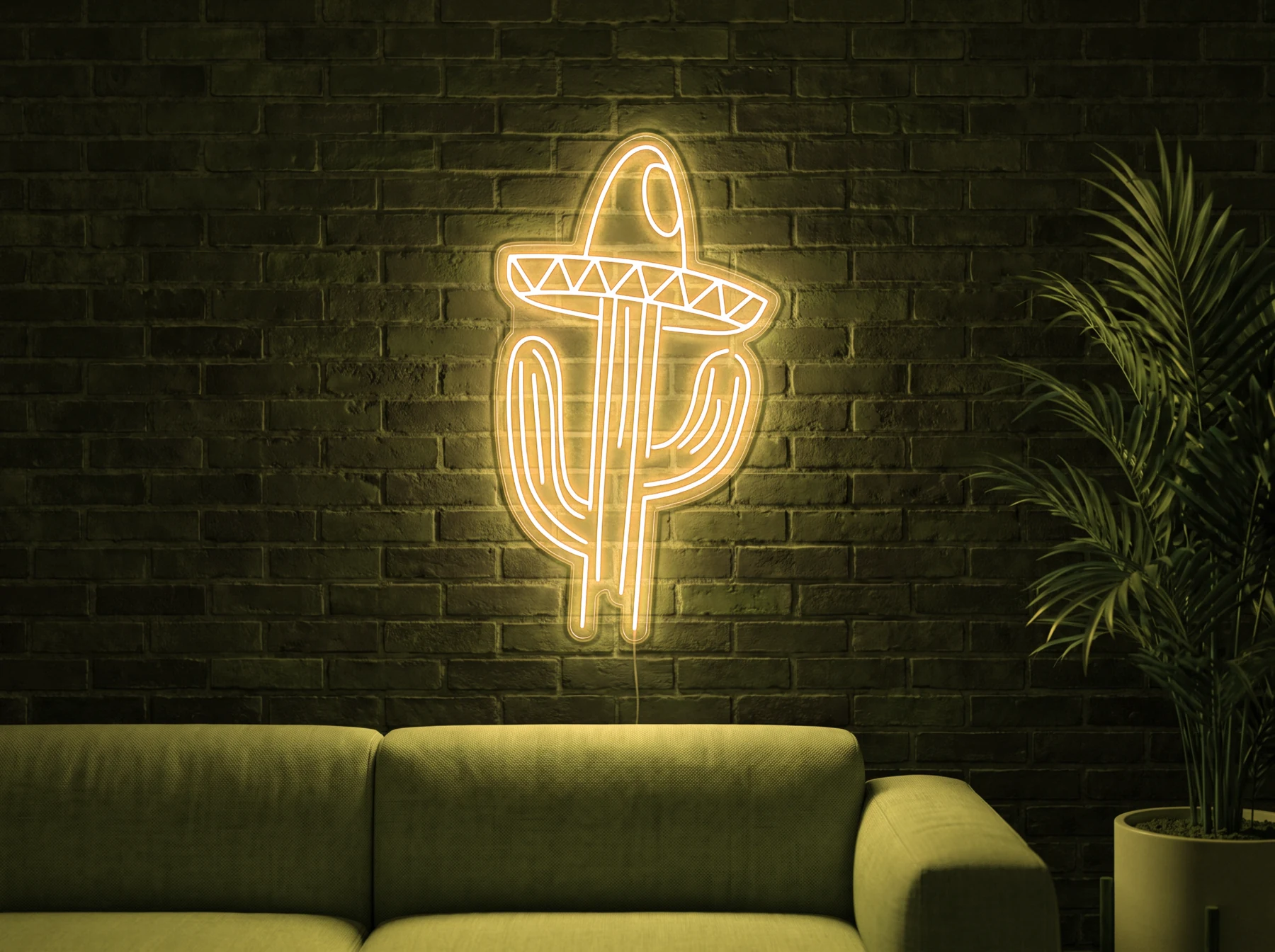 Neonskylt «Kaktus med hatt» i gul LED-neon, monterad på vägg