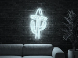 Neonskylt «Kaktus med hatt» i iskall vit LED-neon, monterad på vägg