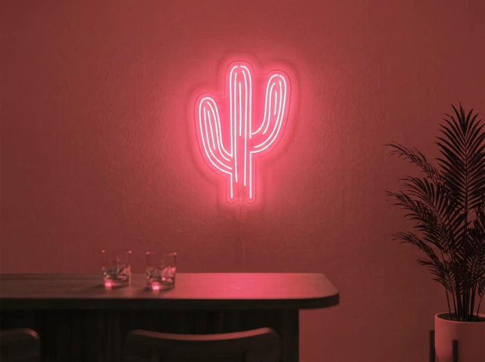 Neonskylt «Kaktus» i röd LED-neon, monterad på vägg
