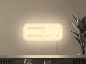 Neonskylt «Karaoke Party» i varmvit LED-neon, monterad på vägg