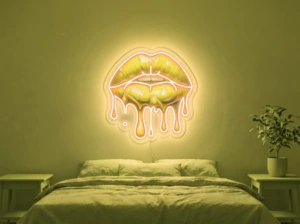 Neonskylt «Läppar» i gul LED-neon, monterad på vägg