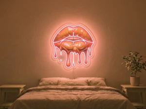 Neonskylt «Läppar» i orange LED-neon, monterad på vägg