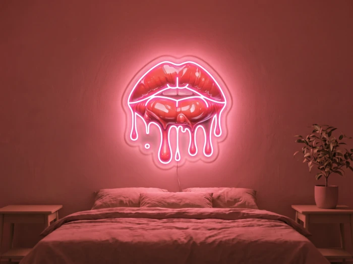 Neonskylt «Läppar» i röd LED-neon, monterad på vägg
