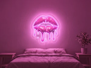 Neonskylt «Läppar» i rosa LED-neon, monterad på vägg