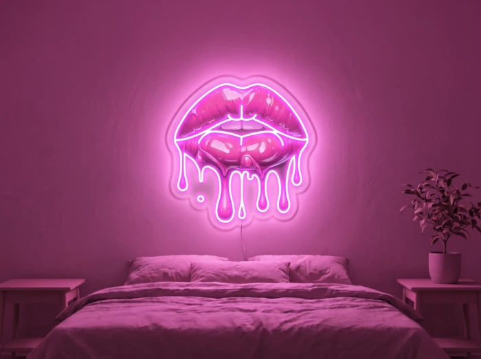 Neonskylt «Läppar» i rosa LED-neon, monterad på vägg