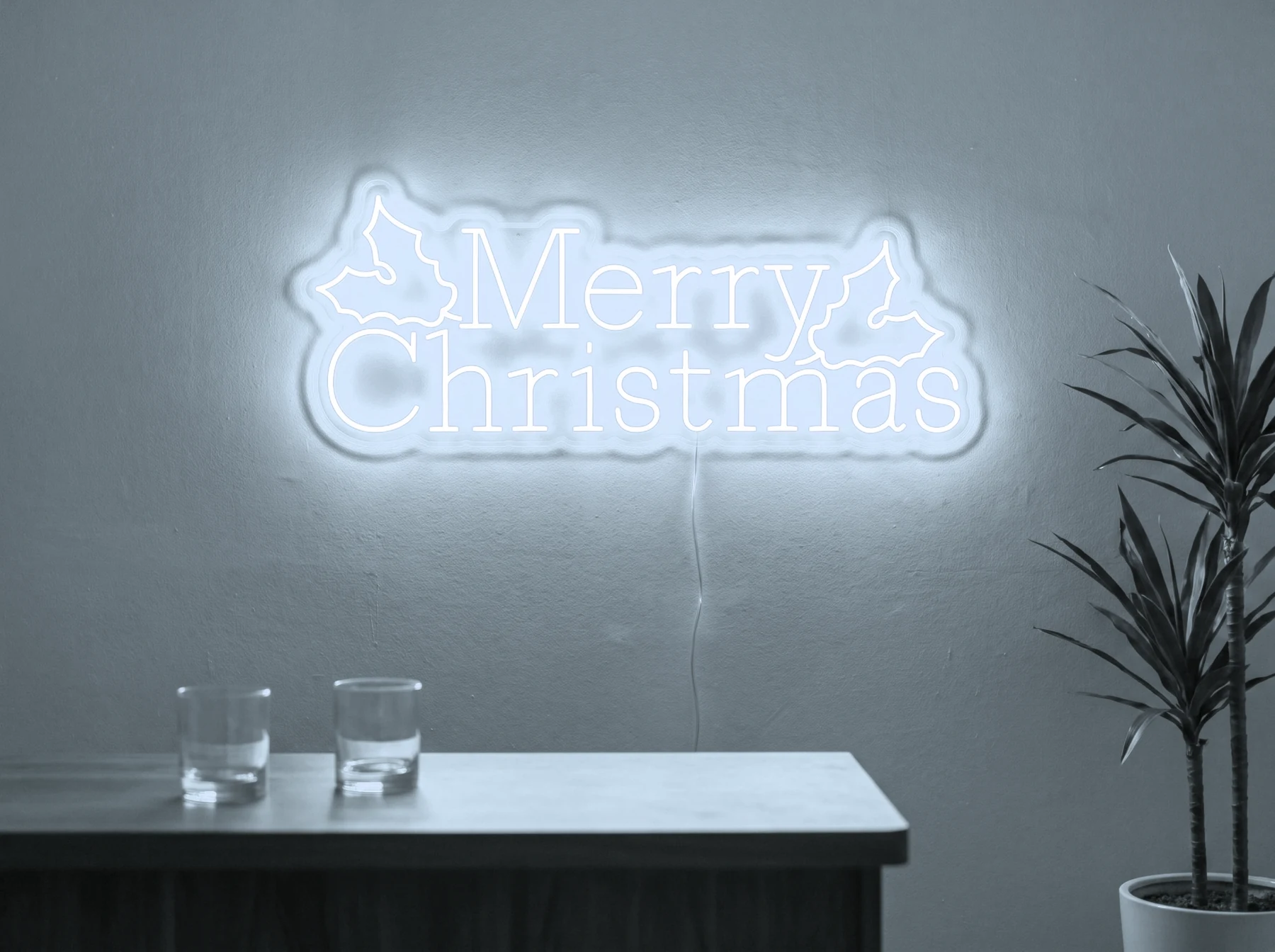 Neonskylt «Merry Christmas» i iskall vit LED-neon, monterad på vägg