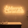 Neonskylt «Merry Christmas» i orange LED-neon, monterad på vägg