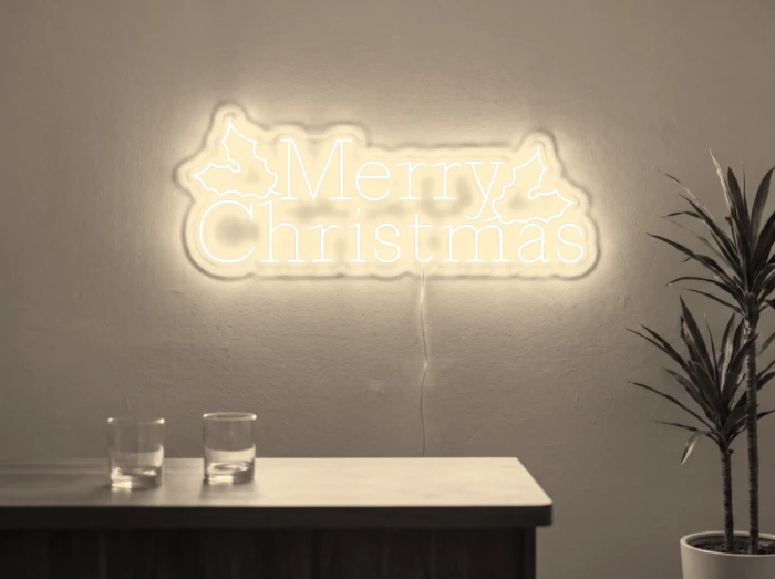 Neonskylt «Merry Christmas» i varmvit LED-neon, monterad på vägg