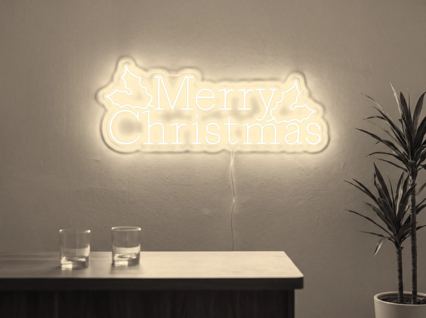 Neonskylt «Merry Christmas» i varmvit LED-neon, monterad på vägg