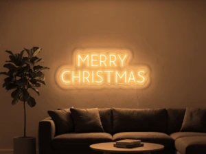 Neonskylt «Merry Christmas, versaler» i orange LED-neon, monterad på vägg