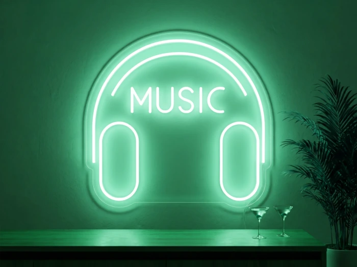 Neonskylt «Musik» i mintgrön LED-neon, monterad på vägg