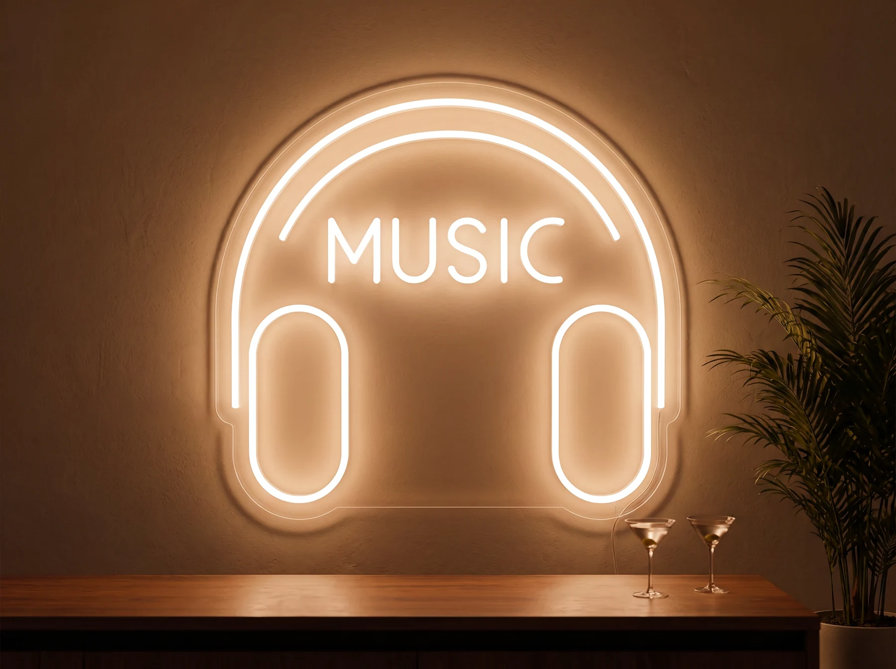 Neonskylt «Musik» i orange LED-neon, monterad på vägg