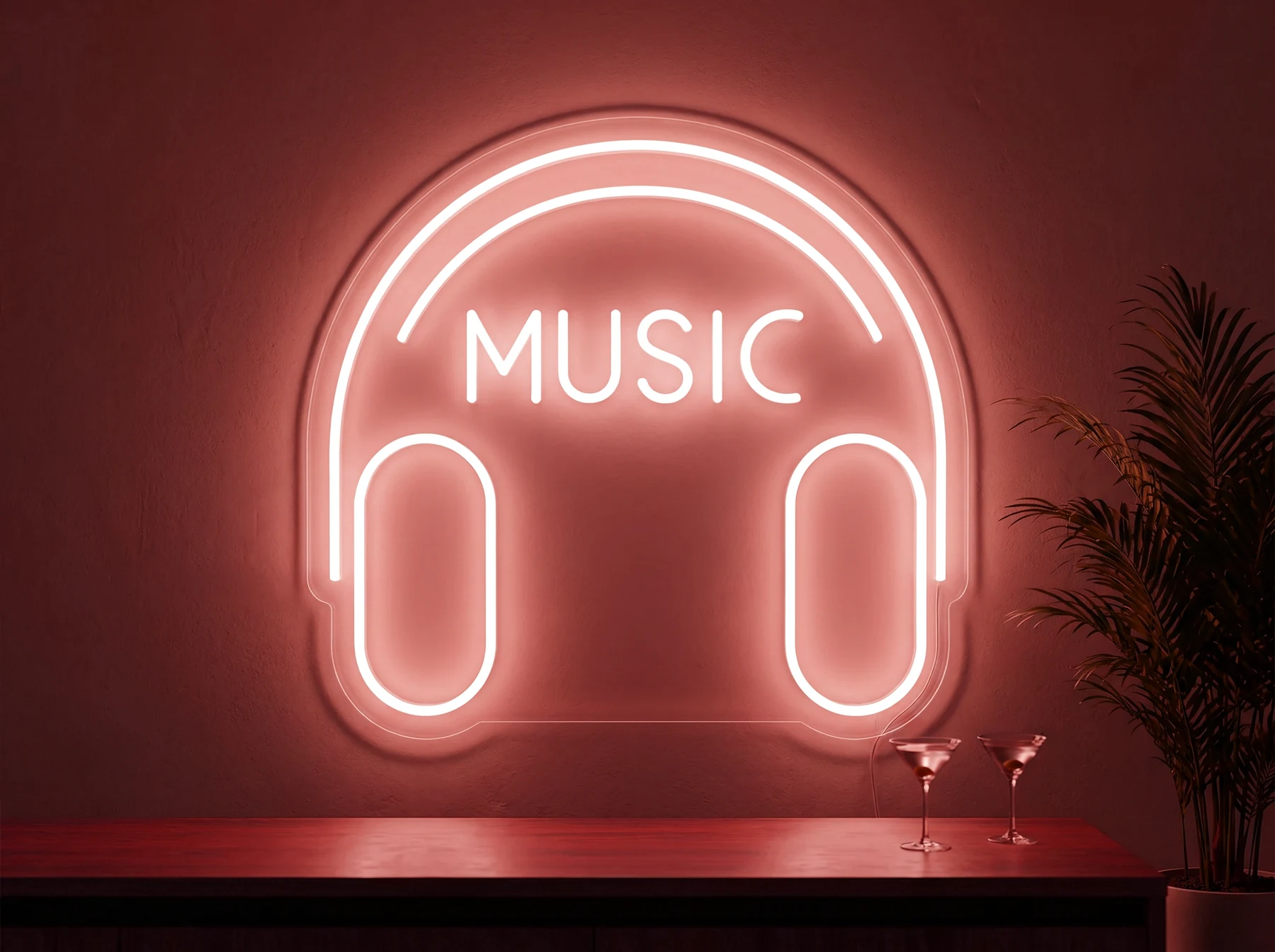 Neonskylt «Musik» i röd LED-neon, monterad på vägg