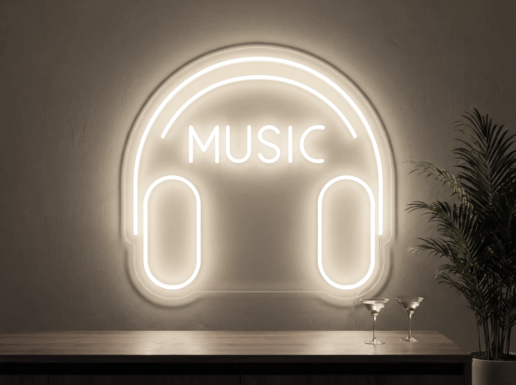 Neonskylt «Musik» i varmvit LED-neon, monterad på vägg