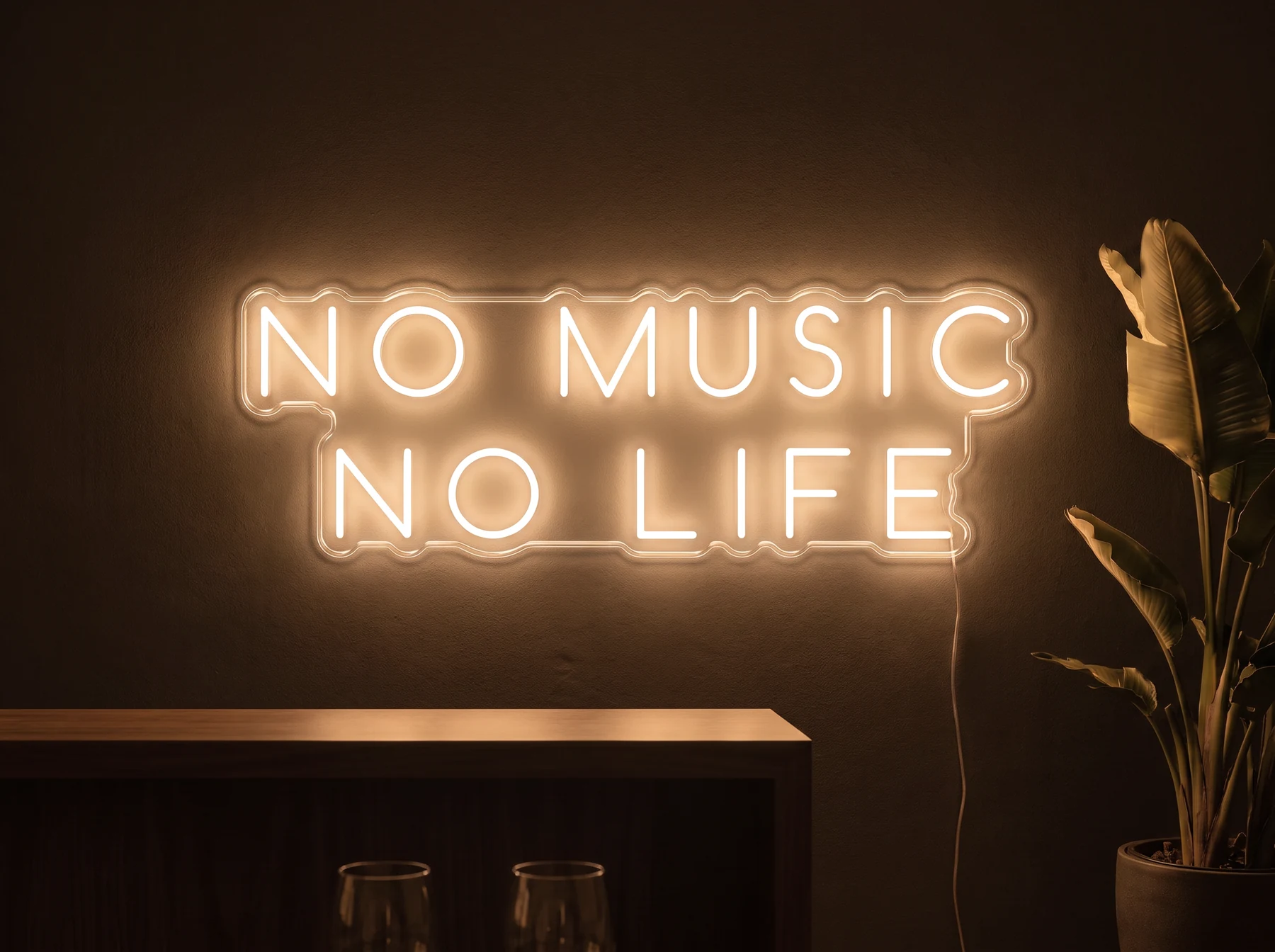 Neonskylt «No Music No Life» i orange LED-neon, monterad på vägg