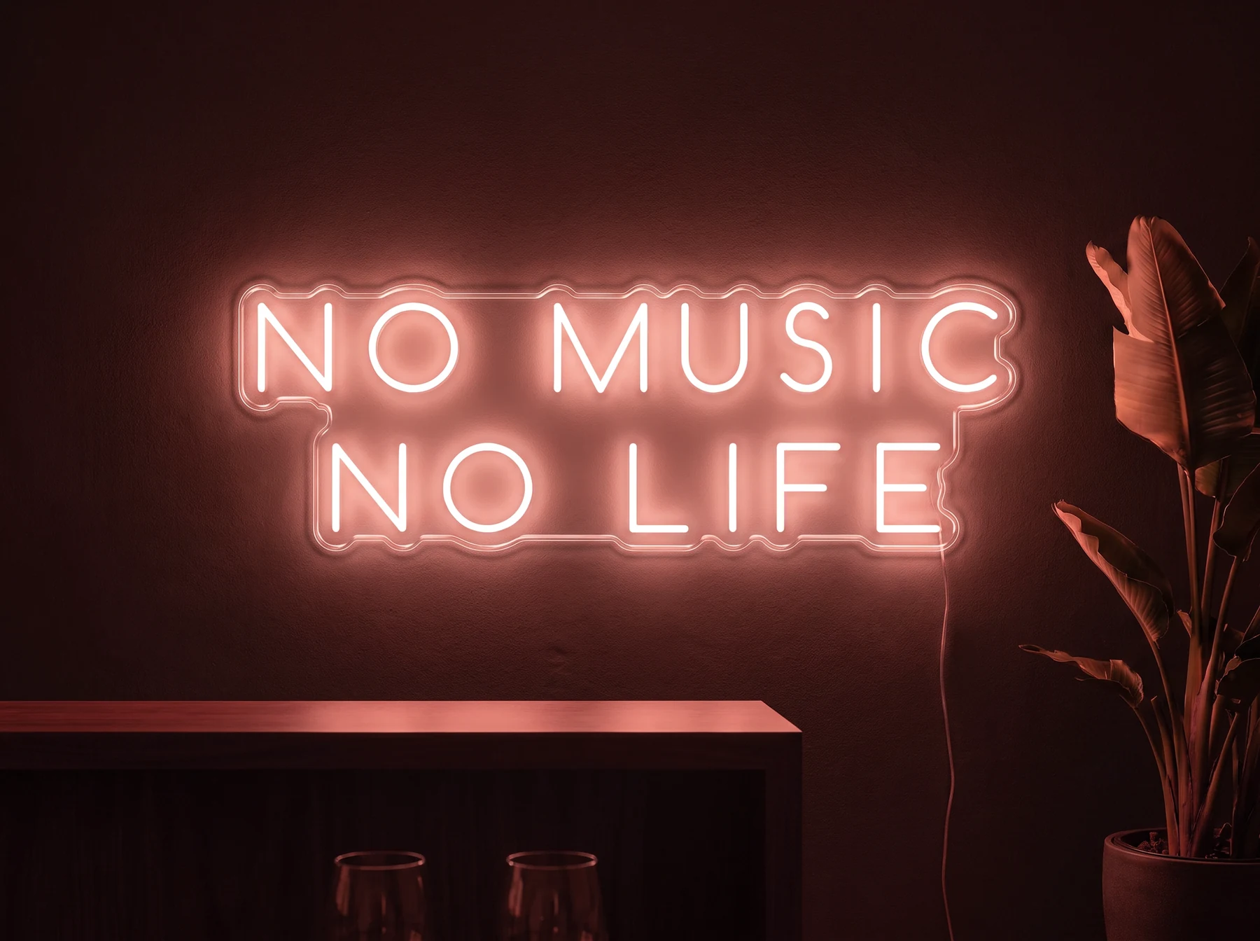 Neonskylt «No Music No Life» i röd LED-neon, monterad på vägg