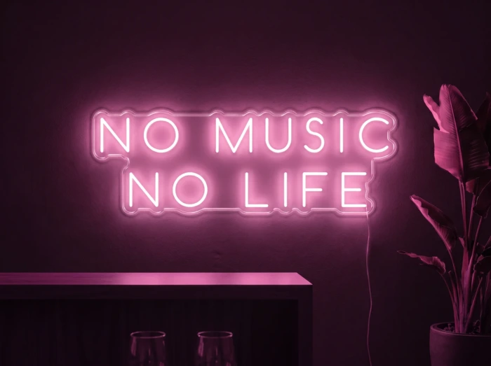 Neonskylt «No Music No Life» i rosa LED-neon, monterad på vägg
