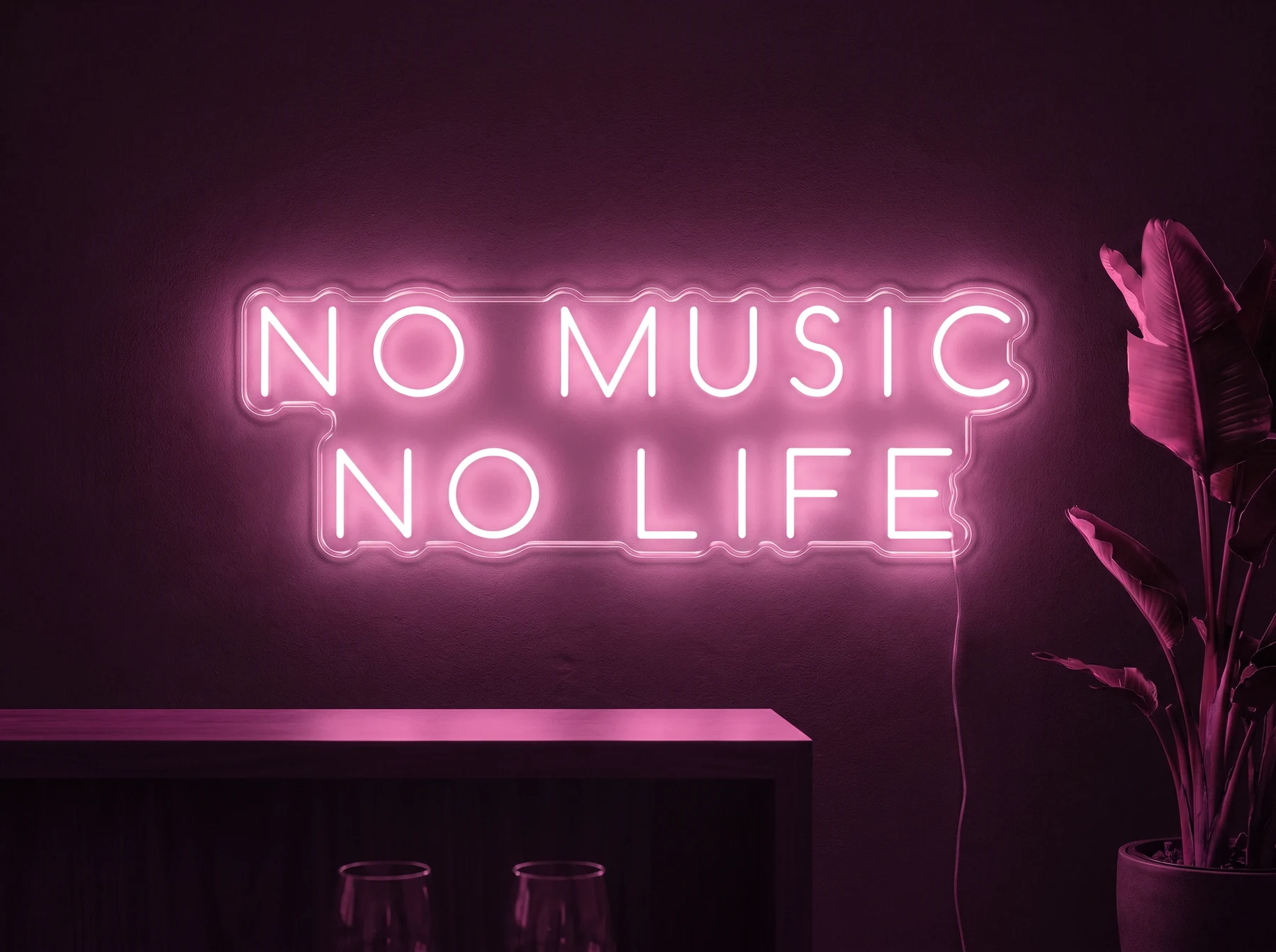 Neonskylt «No Music No Life» i rosa LED-neon, monterad på vägg