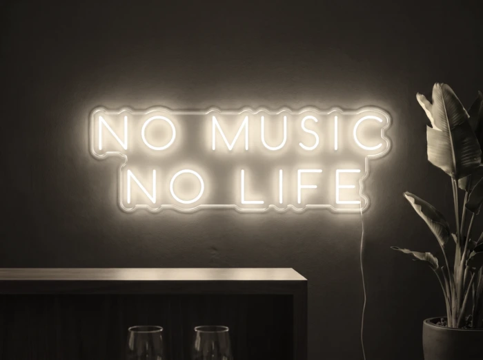 Neonskylt «No Music No Life» i varmvit LED-neon, monterad på vägg