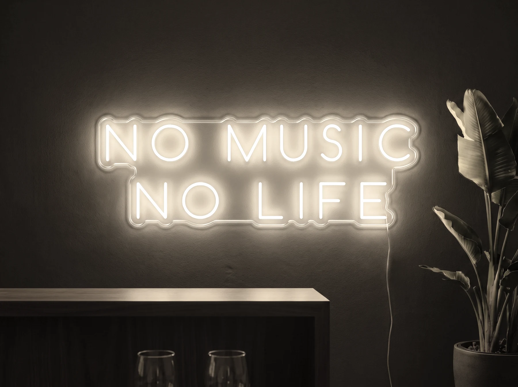 Neonskylt «No Music No Life» i varmvit LED-neon, monterad på vägg