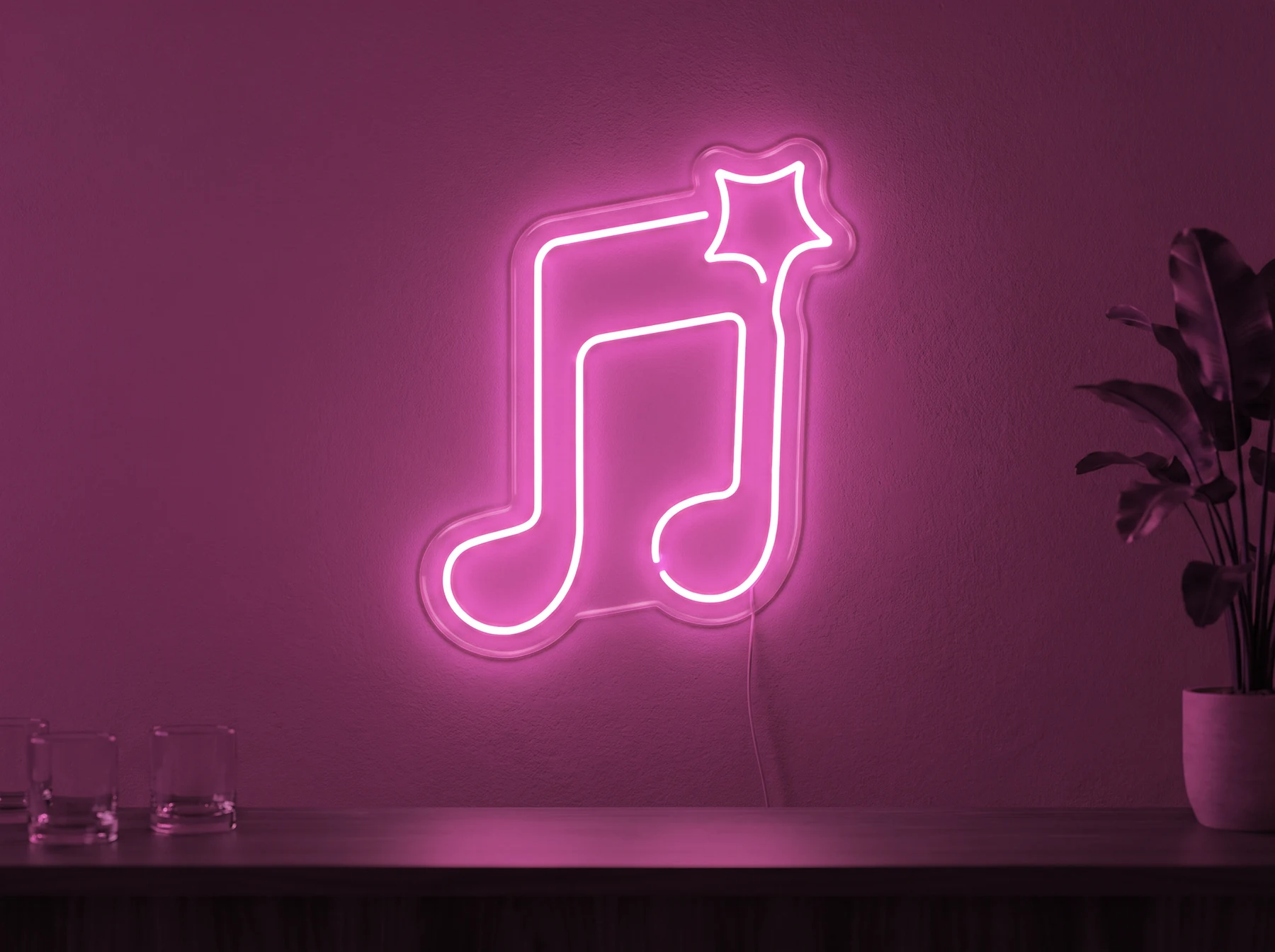 Neonskylt «Not» i rosa LED-neon, monterad på vägg