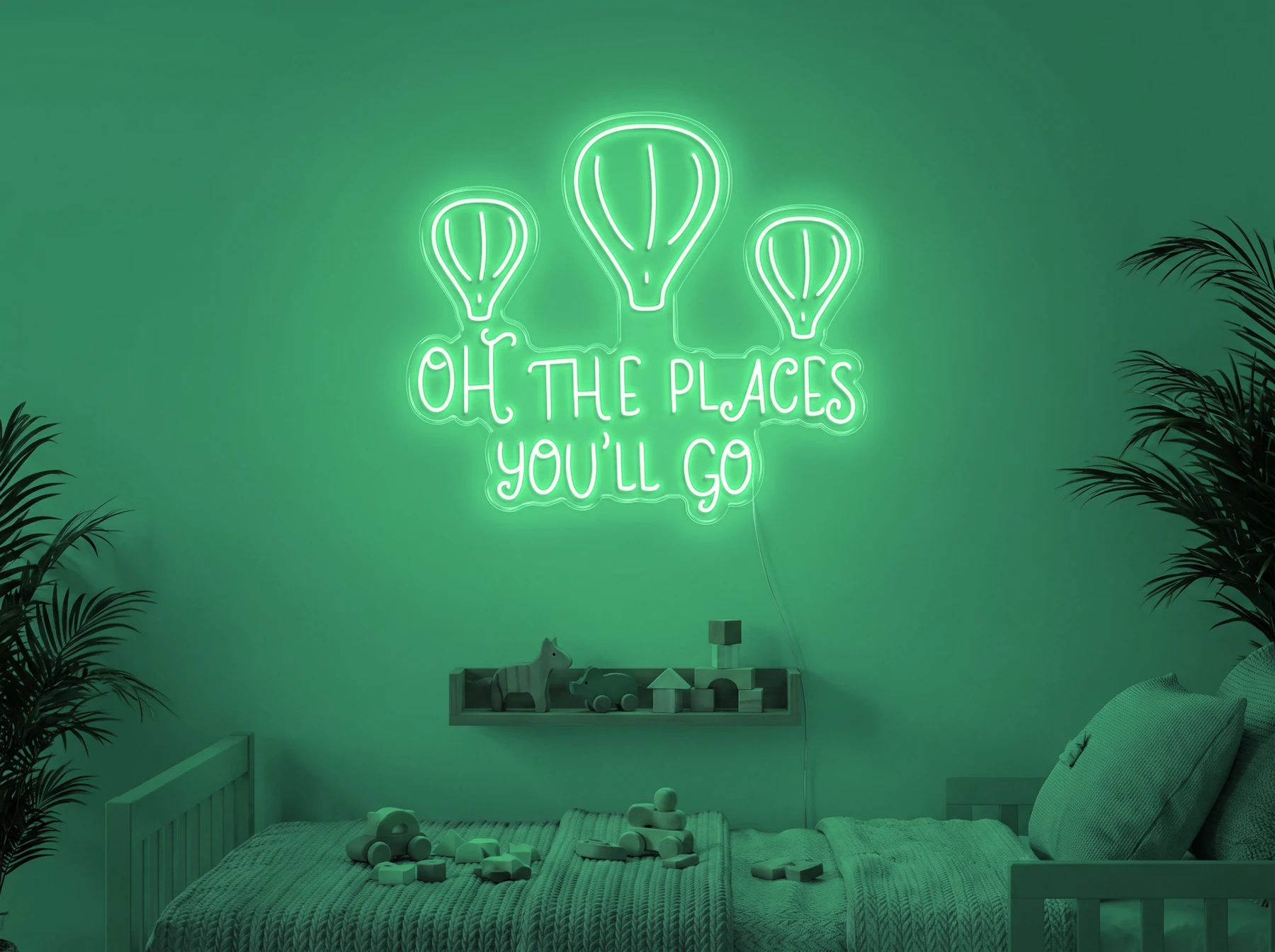 Neonskylt «Oh The Places You’ll Go» i mintgrön LED-neon, monterad på vägg