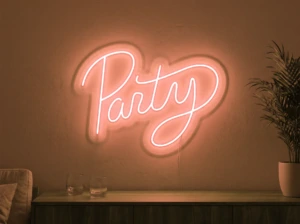 Neonskylt «Party» i orange LED-neon, monterad på vägg
