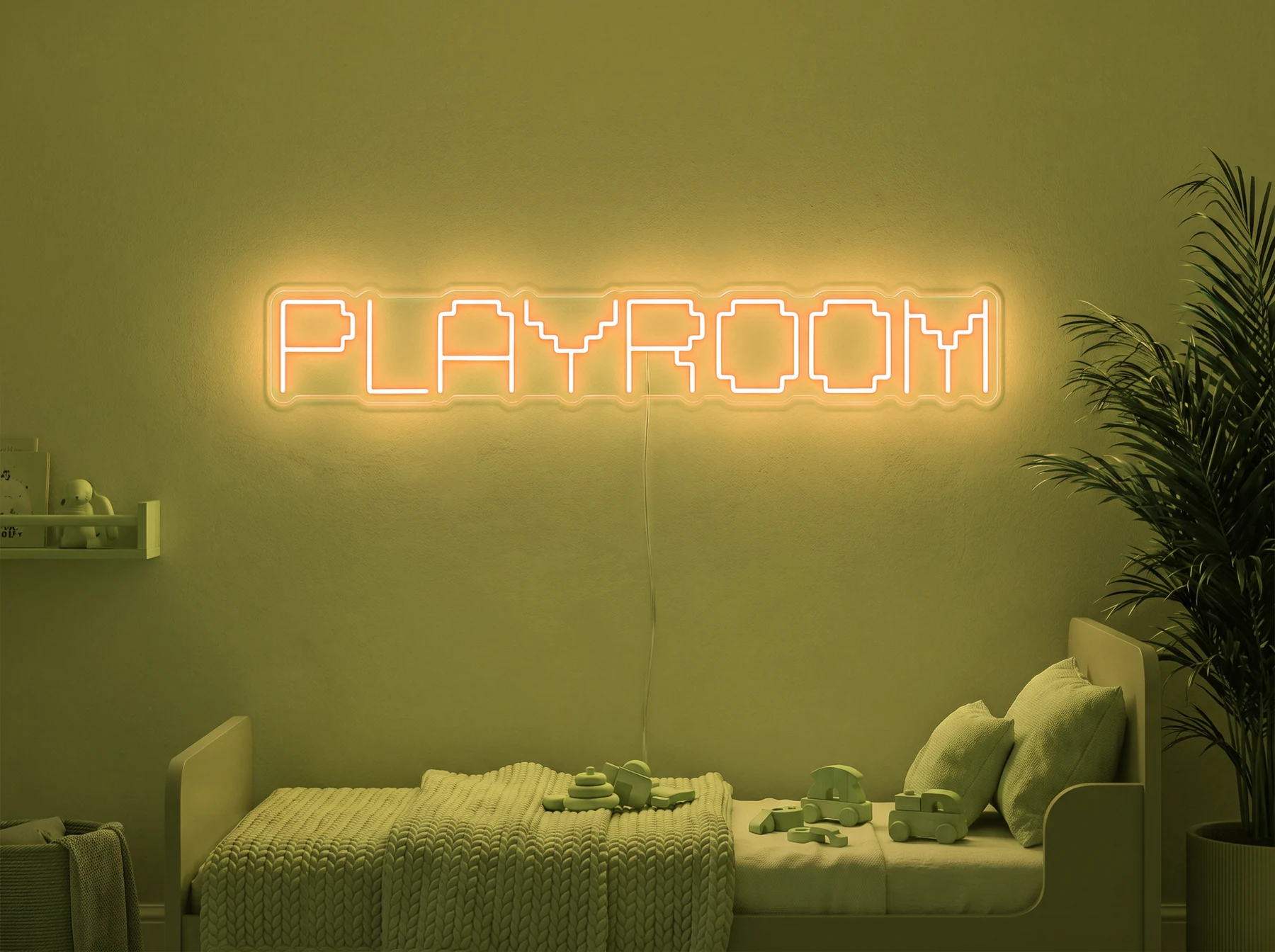 Neonskylt «Playroom» i gul LED-neon, monterad på vägg