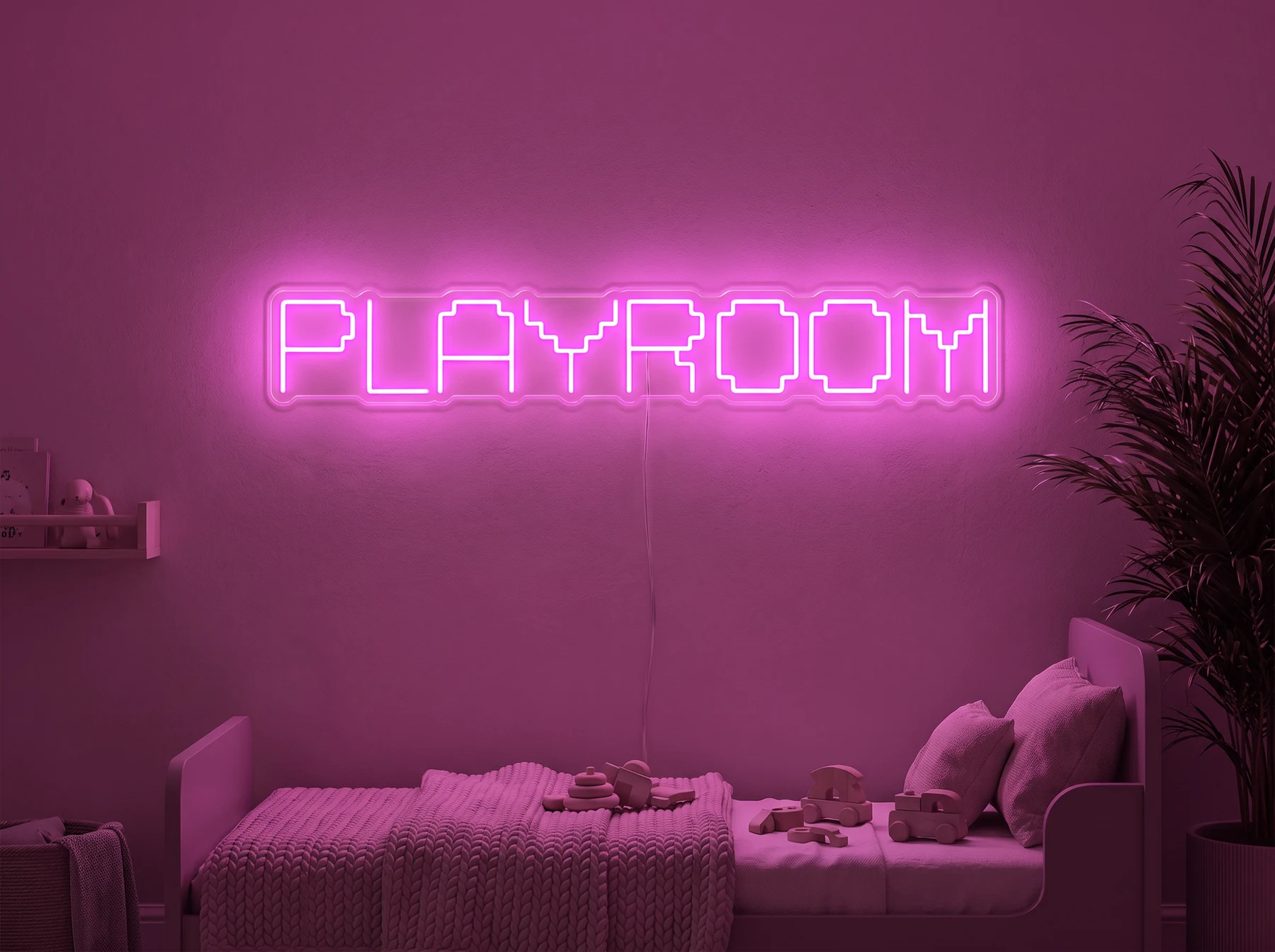 Neonskylt «Playroom» i rosa LED-neon, monterad på vägg