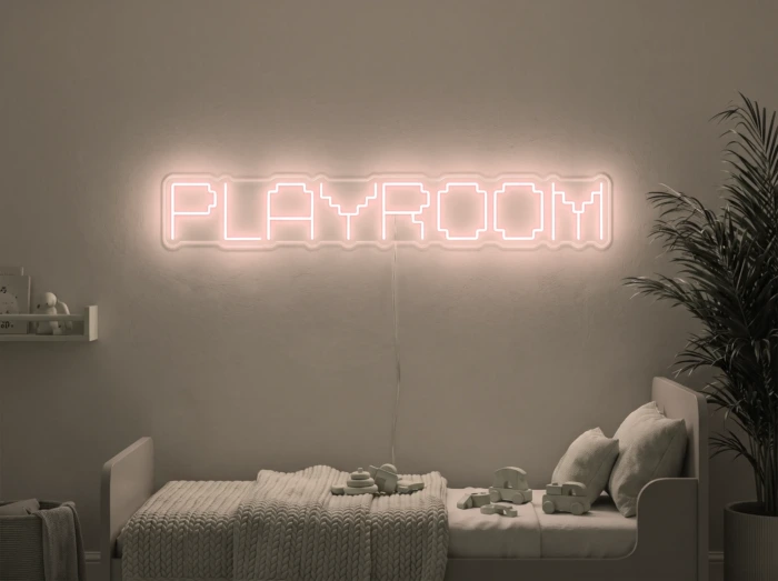 Neonskylt «Playroom» i varmvit LED-neon, monterad på vägg