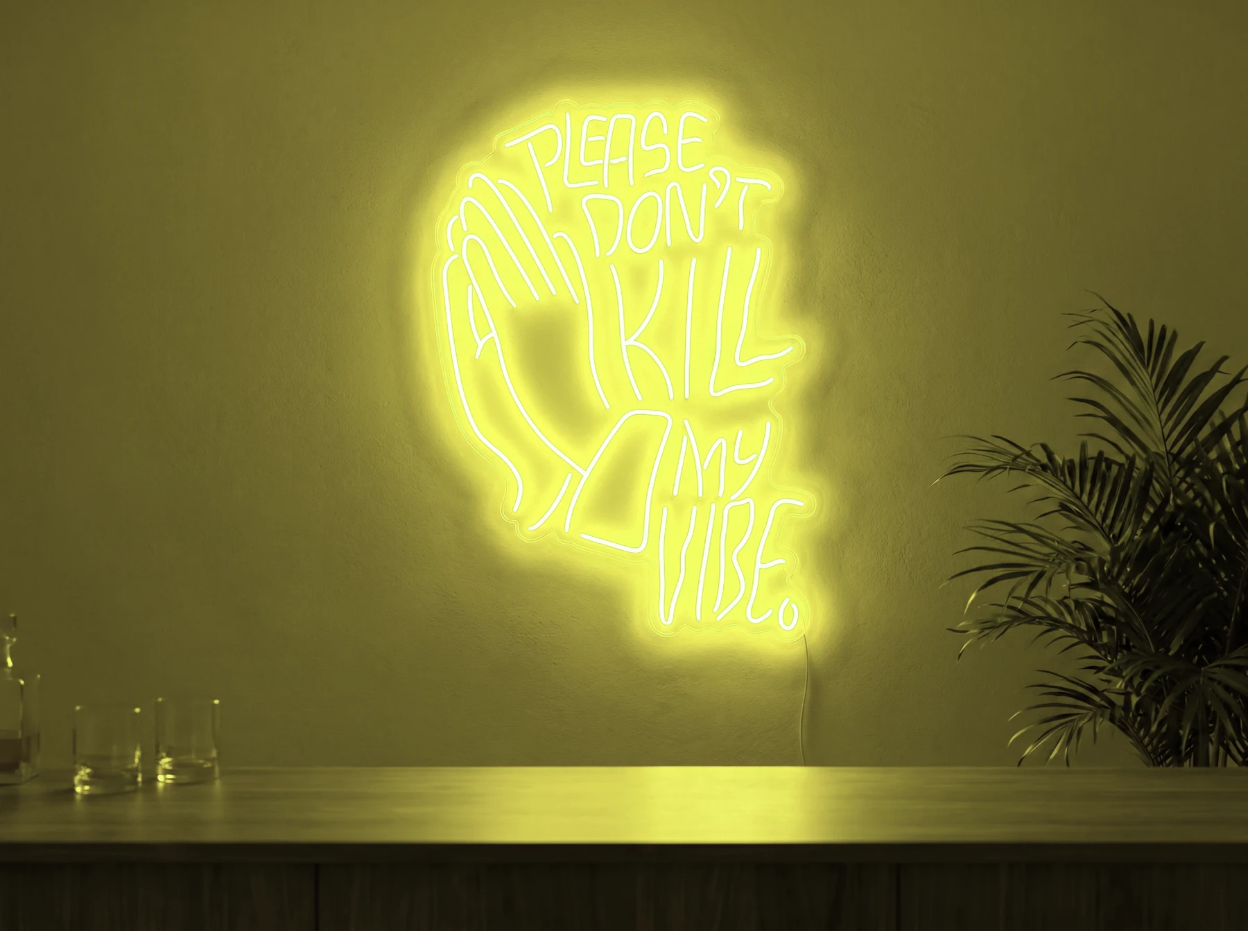 Neonskylt «Please Don’t Kill My Vibe» i gul LED-neon, monterad på vägg
