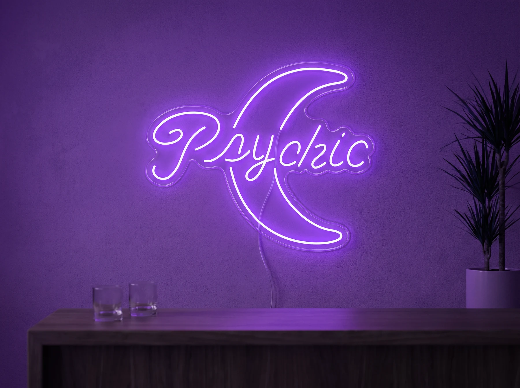 Neonskylt «Psychic» i lila LED-neon, monterad på vägg