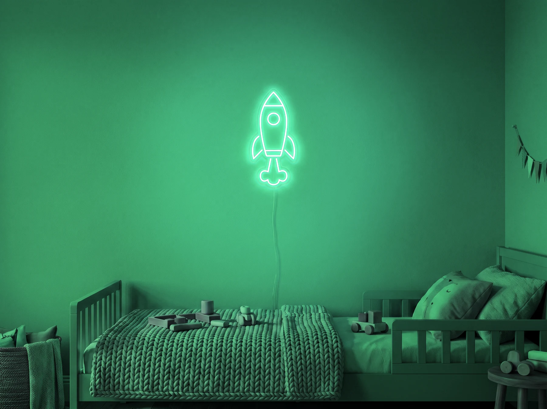 Neonskylt «Raket» i mintgrön LED-neon, monterad på vägg