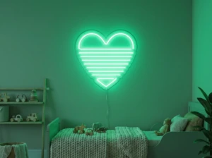 Neonskylt «Regnbågshjärta» i mintgrön LED-neon, monterad på vägg
