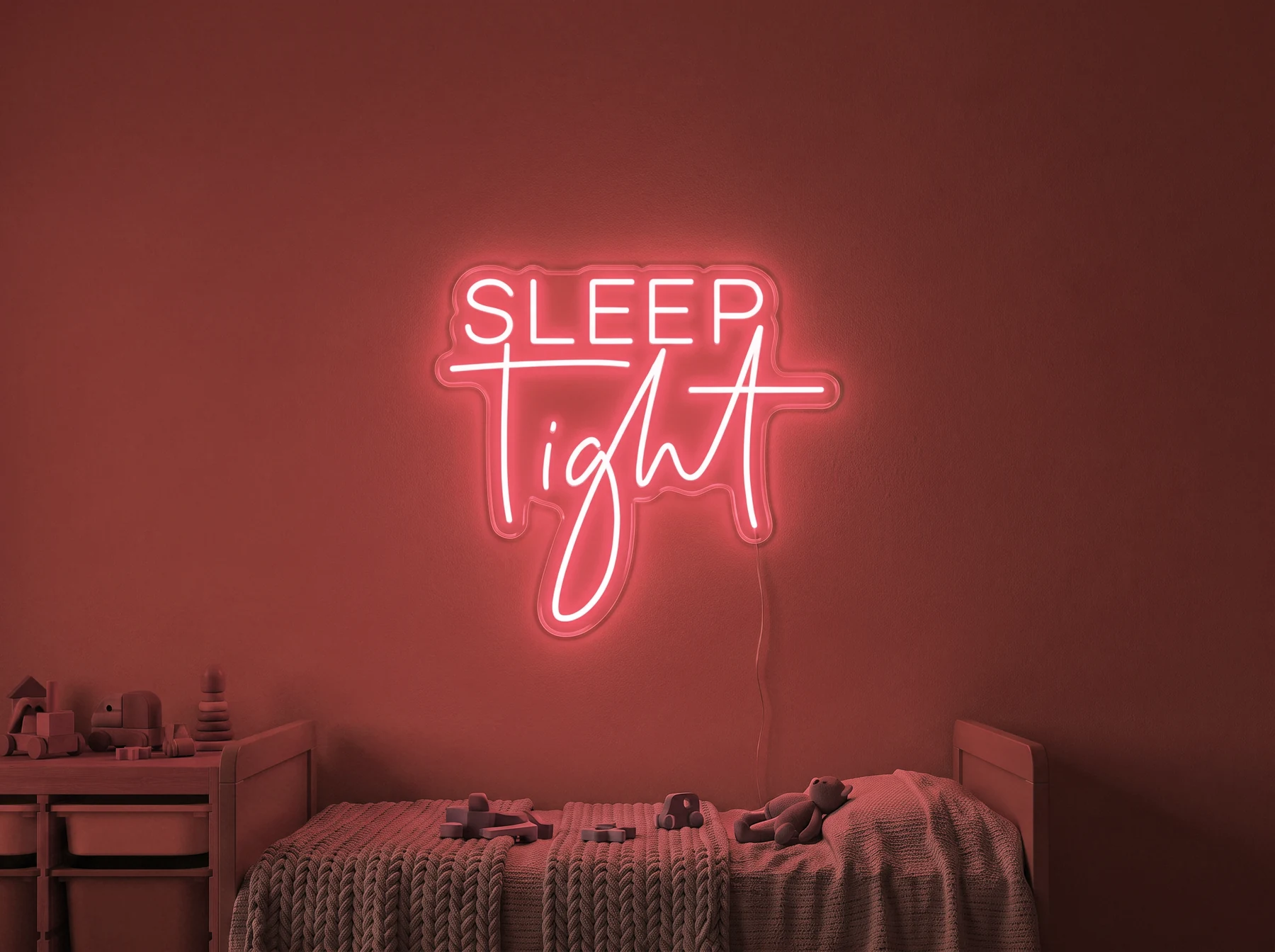 Neonskylt «Sleep Tight» i röd LED-neon, monterad på vägg