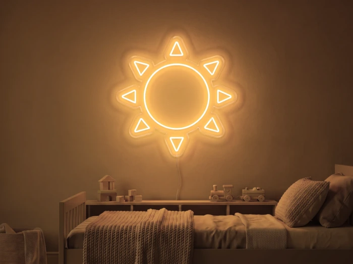 Neonskylt «Sol» i orange LED-neon, monterad på vägg