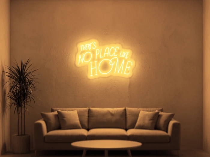 Neonskylt «There’s No Place Like Home, retro» i orange LED-neon, monterad på vägg