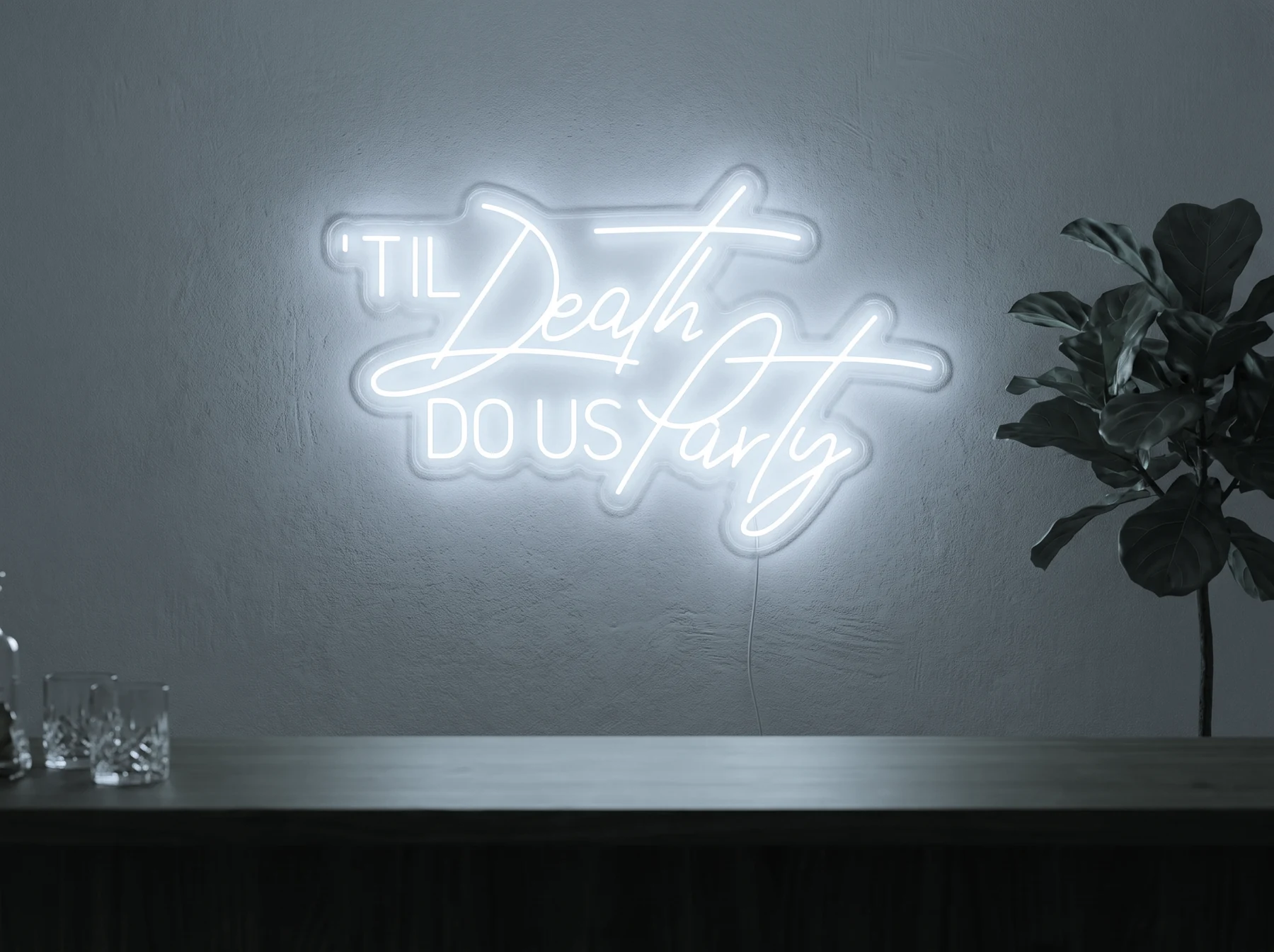 Neonskylt «Til Death Do Us Party» i iskall vit LED-neon, monterad på vägg