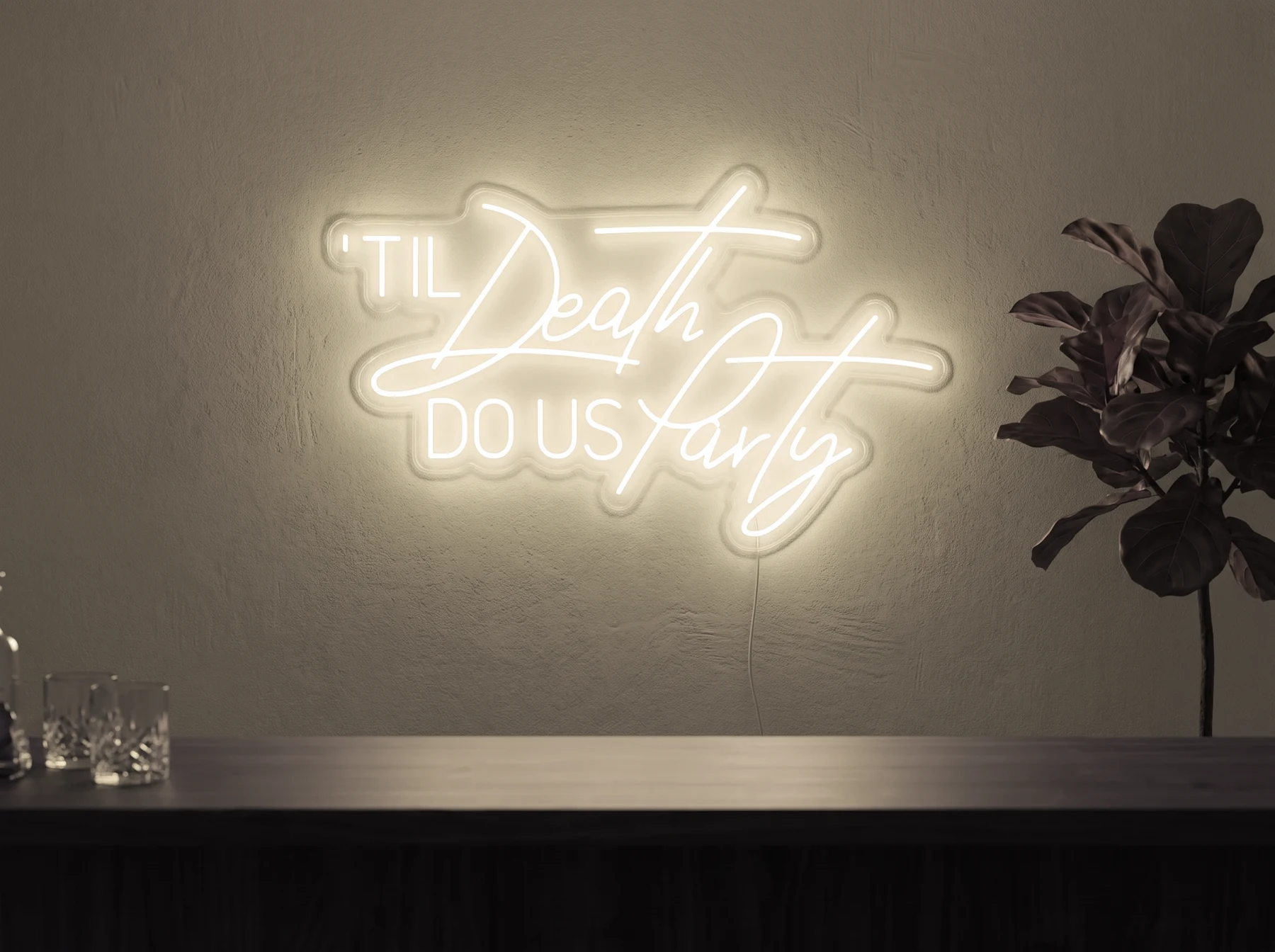Neonskylt «Til Death Do Us Party» i varmvit LED-neon, monterad på vägg