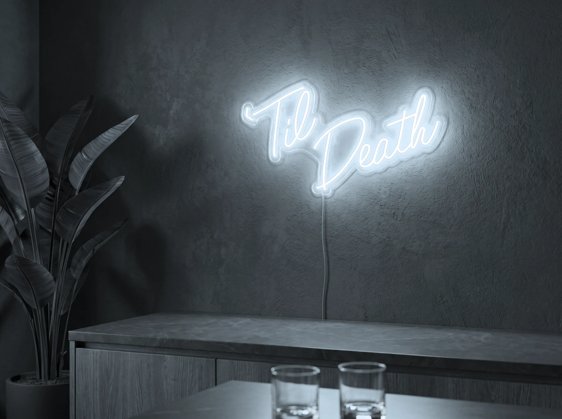 Neonskylt «Til Death» i iskall vit LED-neon, monterad på vägg