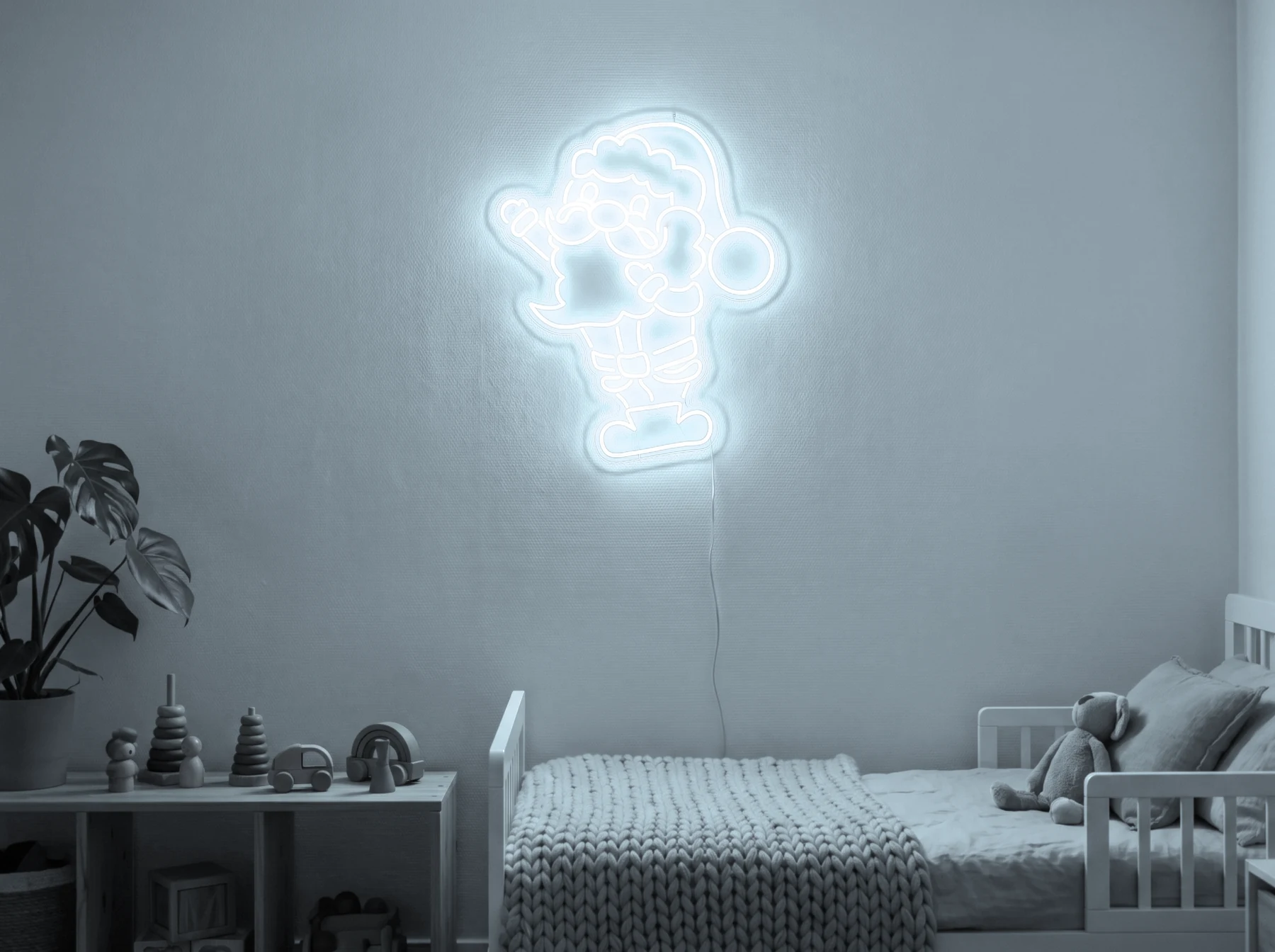 Neonskylt «Tomten» i iskall vit LED-neon, monterad på vägg