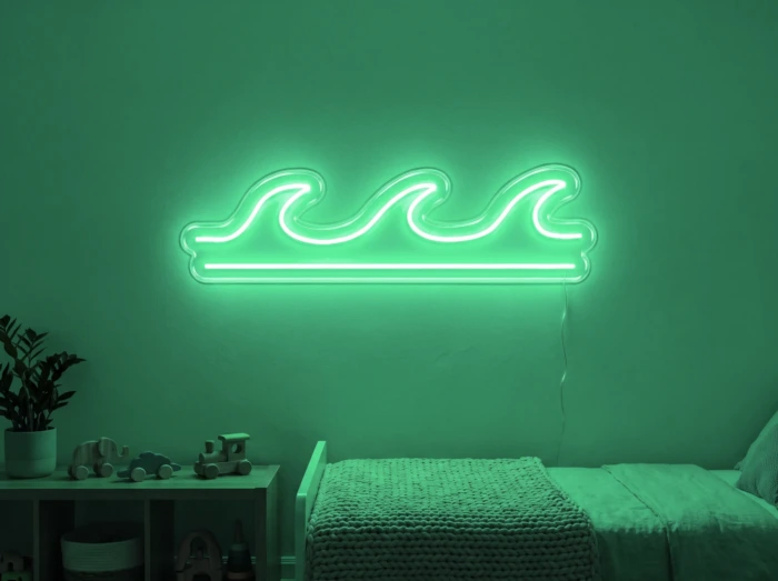 Neonskylt «Våg» i mintgrön LED-neon, monterad på vägg