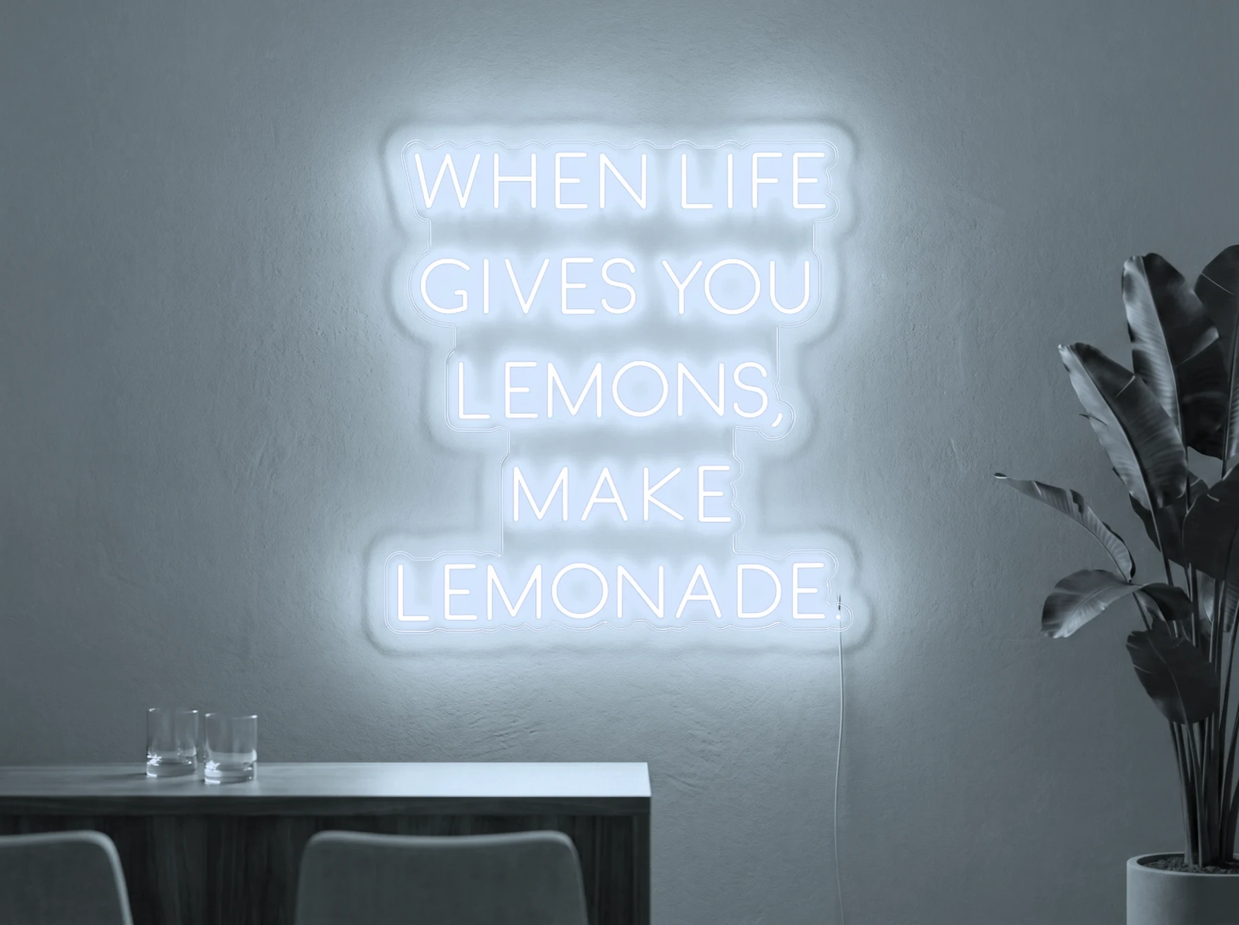 Neonskylt «When Life Gives You Lemons» i iskall vit LED-neon, monterad på vägg
